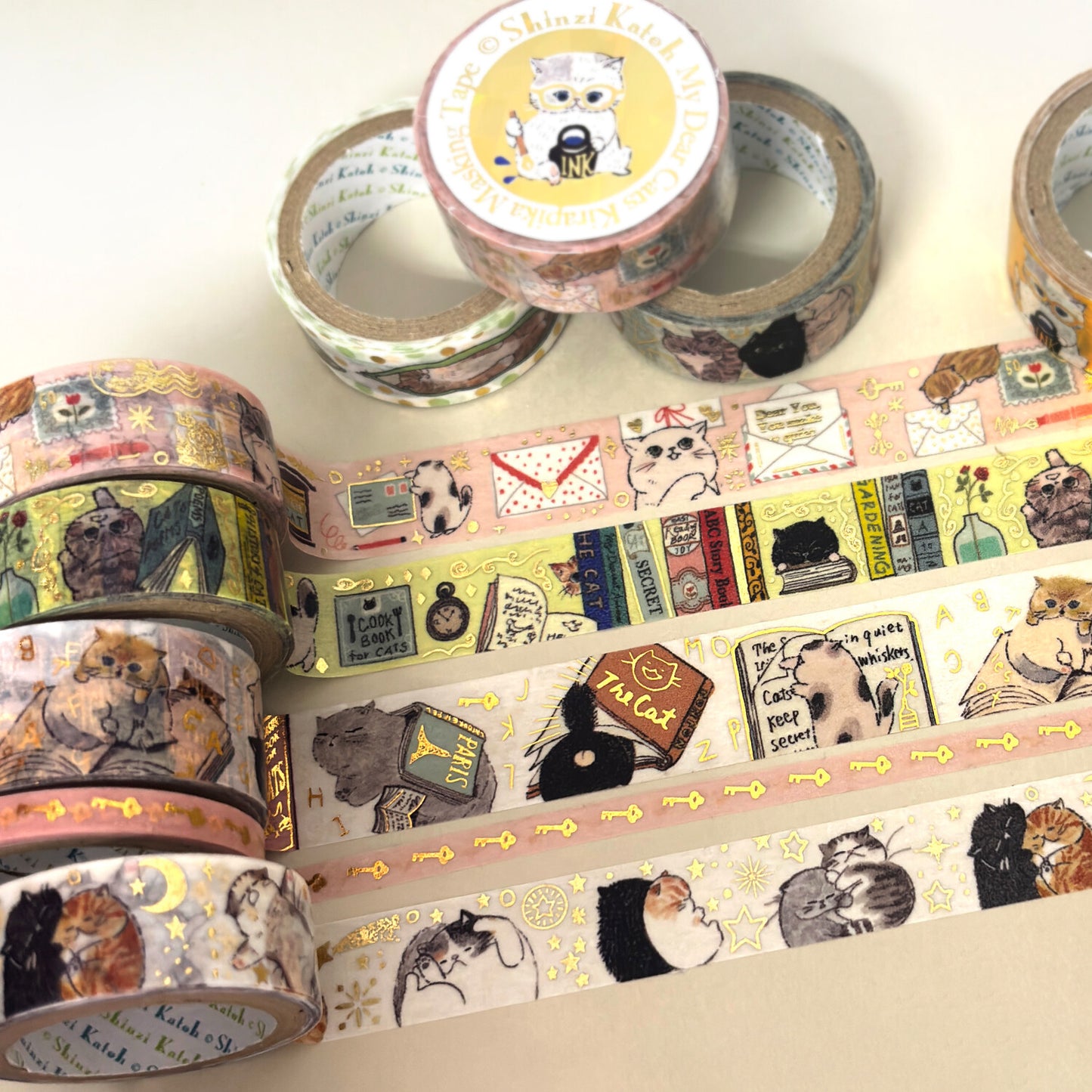 A set of decorative washi tapes with vintage-style illustrations of cats