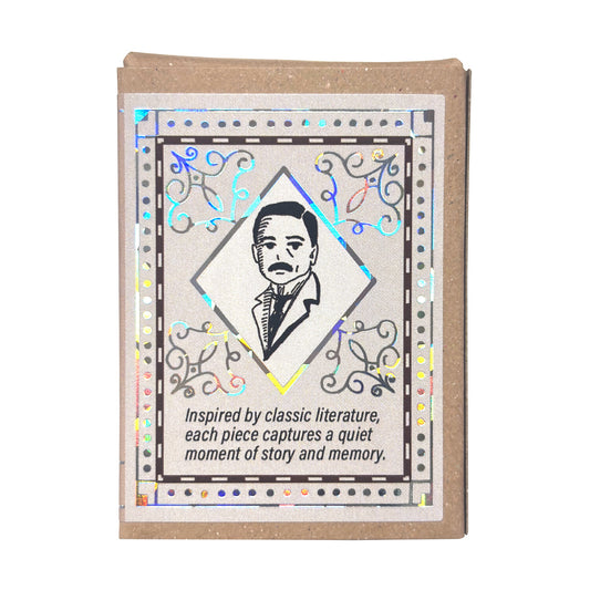 A rectangular sticker box with a kraft paper backing, featuring a black-and-white portrait illustration in the center, ornate border details, and printed text at the bottom. The card is photographed on a plain white background.