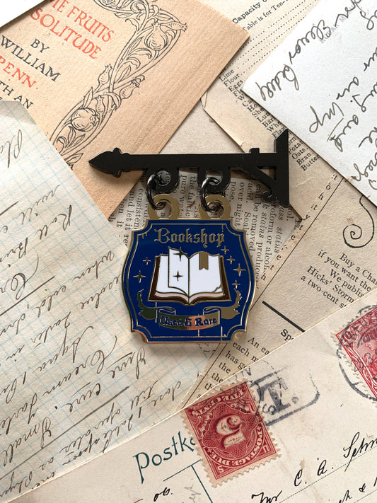 The Creeping Moon - Enamel Pin - Bookshop Sign