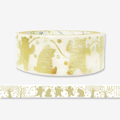 Roll of decorative tape with gold animal illustrations on a white background