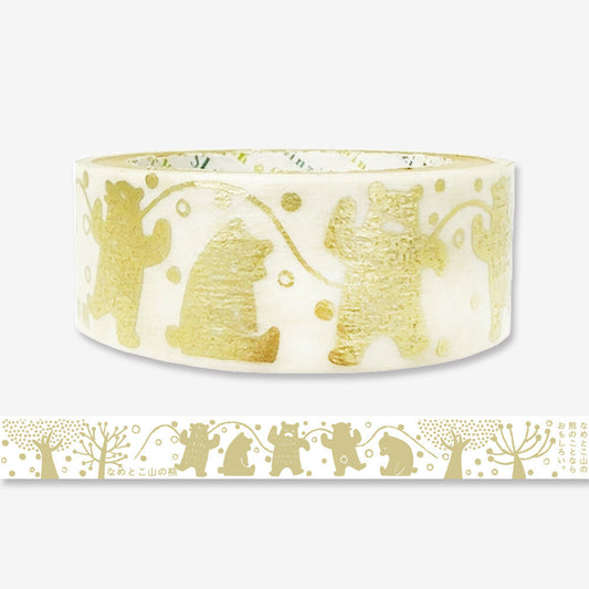 Roll of decorative tape with gold animal illustrations on a white background