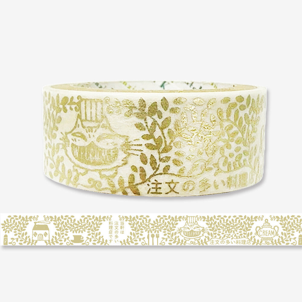 Roll of decorative tape with gold patterns on a white background