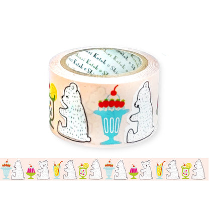 A roll of washi tape featuring cute polar bear illustrations and colorful dessert prints, shown alongside a flat strip of the pattern on a white background.