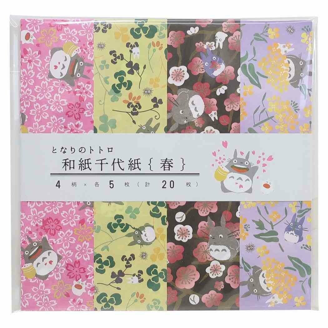 A packaged set of Japanese Totoro-themed paper sheets with multiple floral and character patterns, shown in a clear plastic sleeve with a white paper band label.
