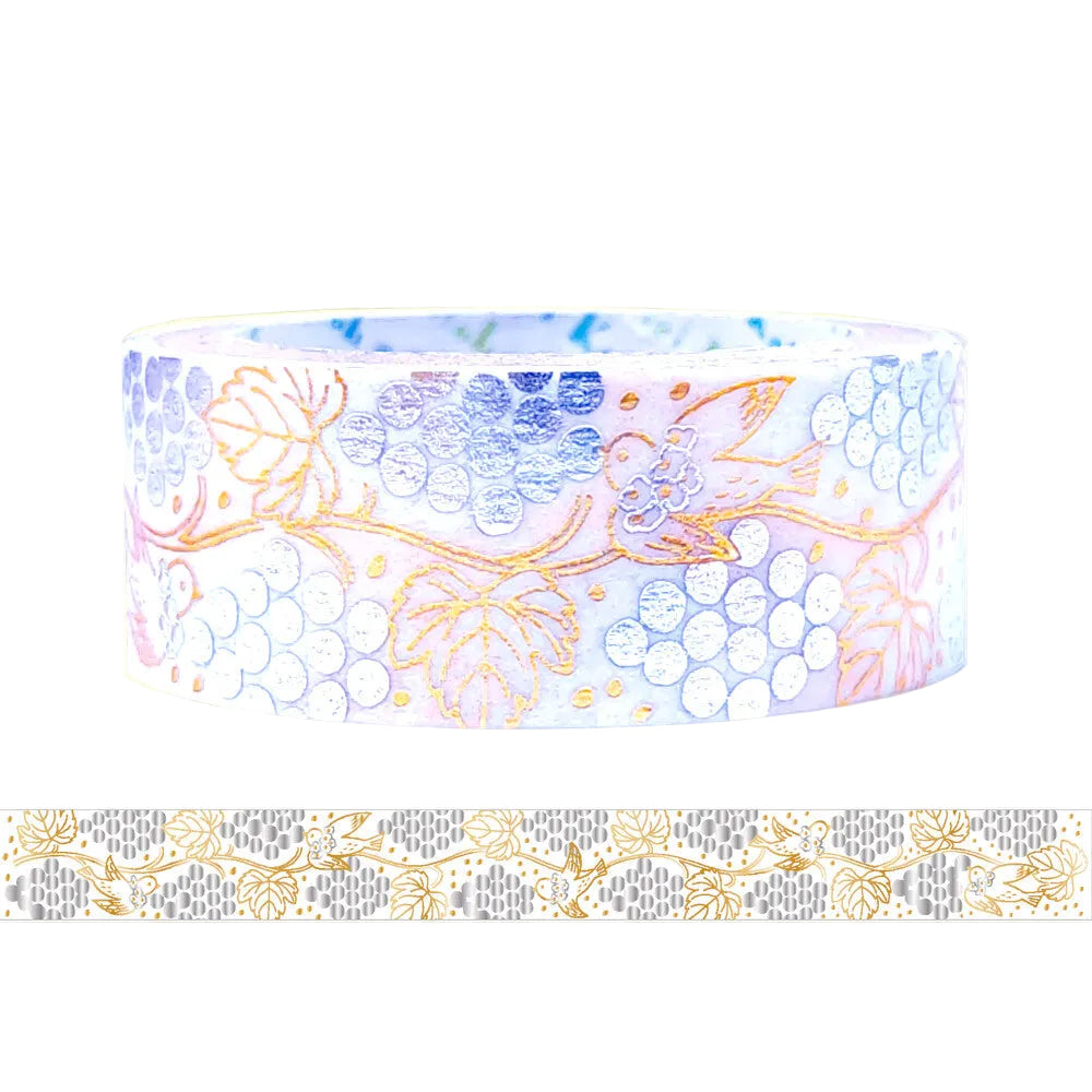 A roll of decorative washi tape featuring a pattern grapes, birds, and gold vine details