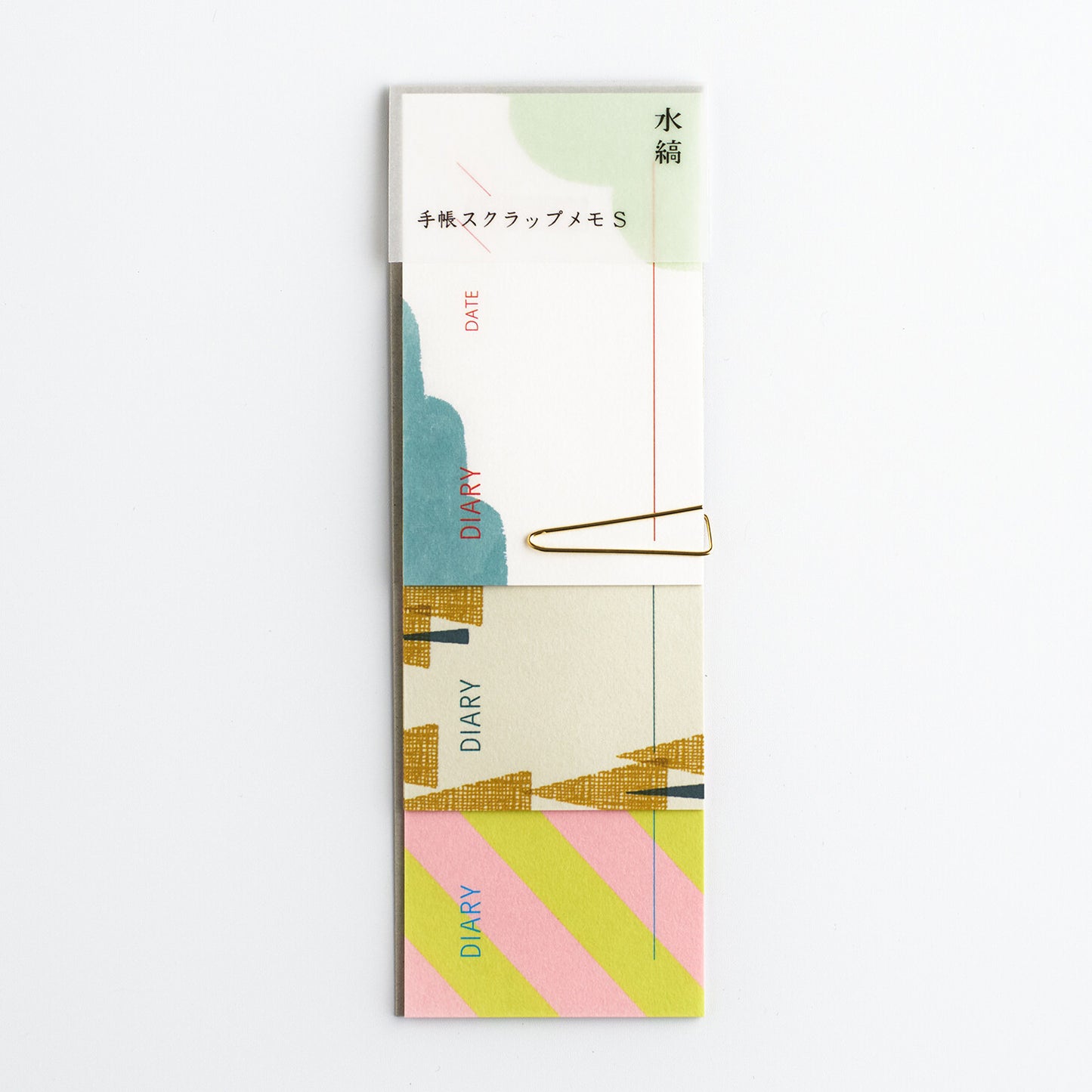 Colorful diary memo pad with geometric design on a white background