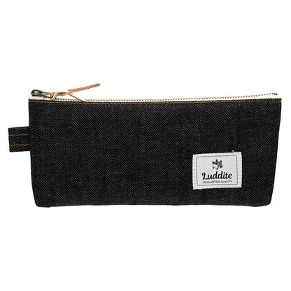 Black denim pencil pouch with a Luddite brand label on a white background