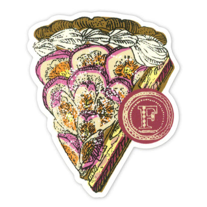 A die-cut sticker featuring an illustrated slice of layered fruit tart with pink and orange details, plus a round red seal with a white letter F. The sticker has a white border.