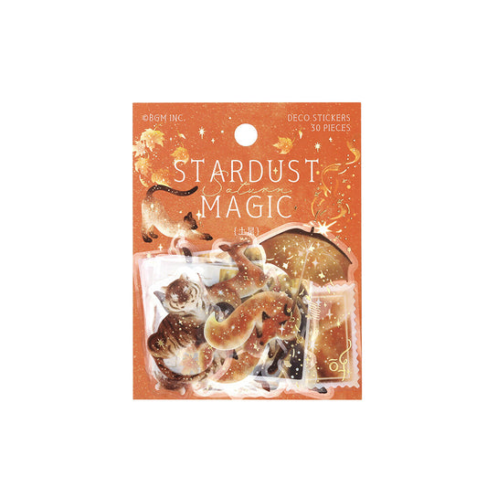 Pack of 'Stardust Magic' deco stickers with starry animal and magic illustrations on an orange background.