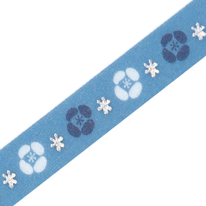 Blue slim washi tape with floral designs on a white background