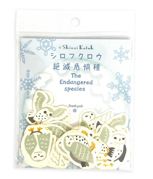 Packaged stickers with owl designs and text on a white background