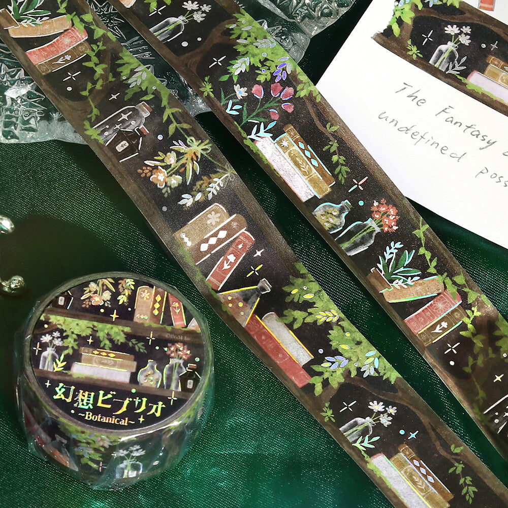 Decorative tape with fantasy-themed designs on a green fabric background