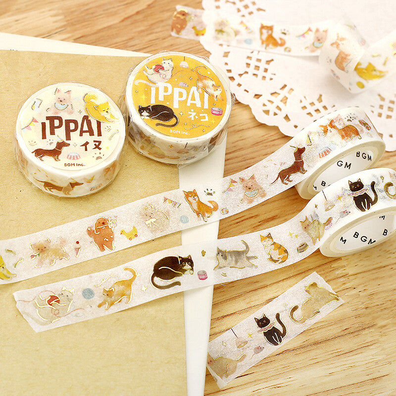 Washi tape with animal designs and 'IPPAI' branding on a wooden surface