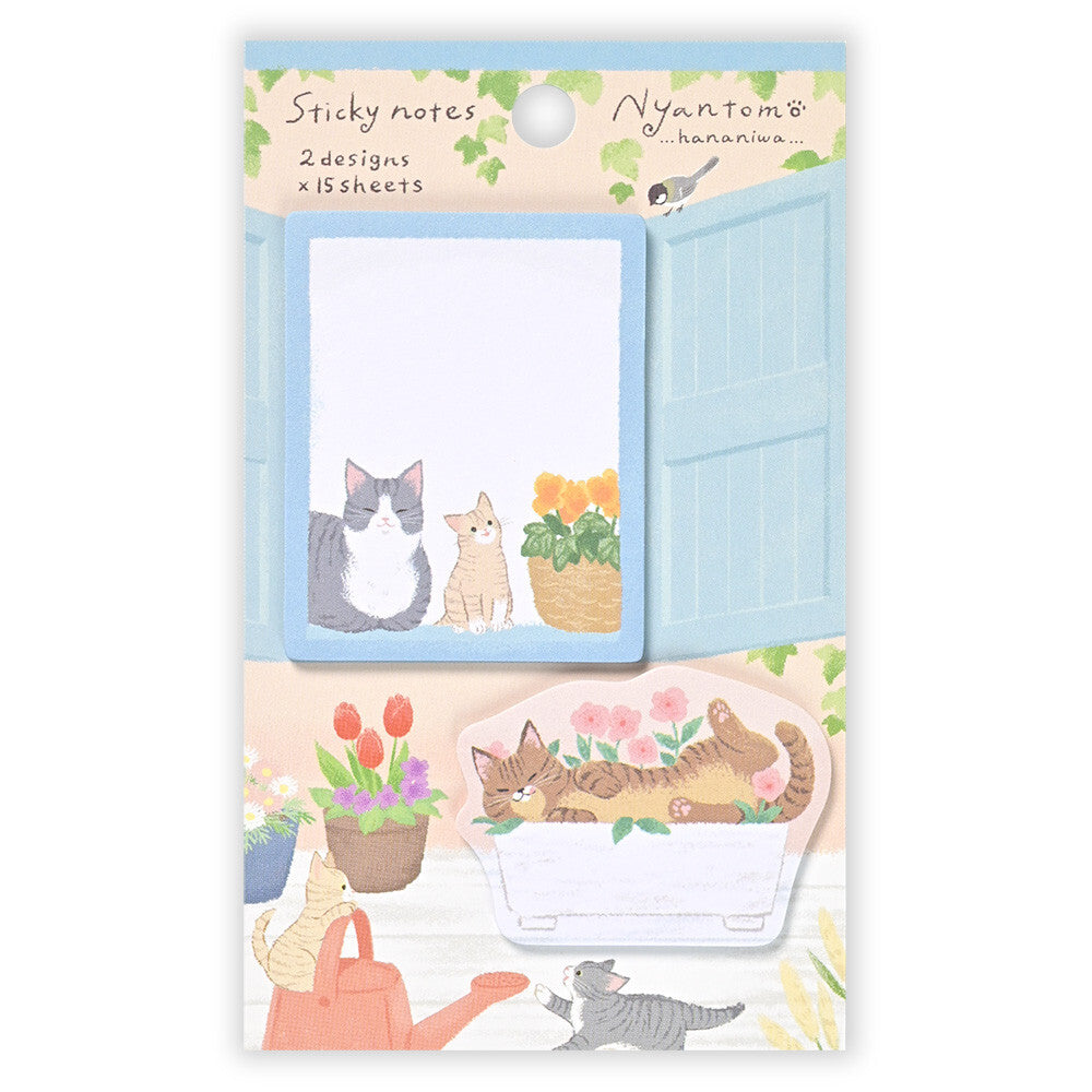 Sticky notes with cat-themed designs in a decorative package