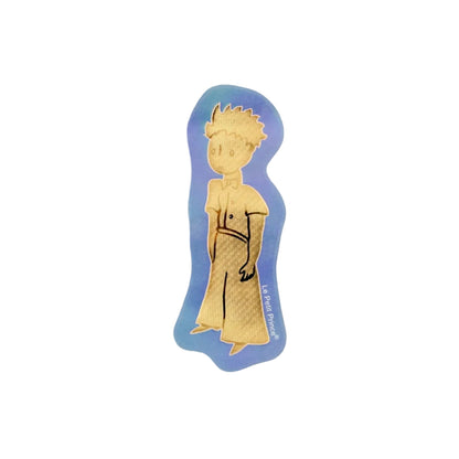 Sticker of a character from 'The Little Prince' by Antoine de Saint-Exupéry on a white background.