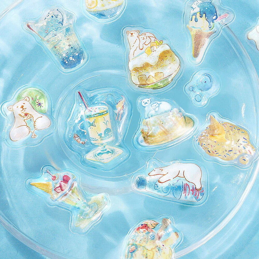 Set of cute illustrations of ice cream cones, bears, and other treats on a blue background.