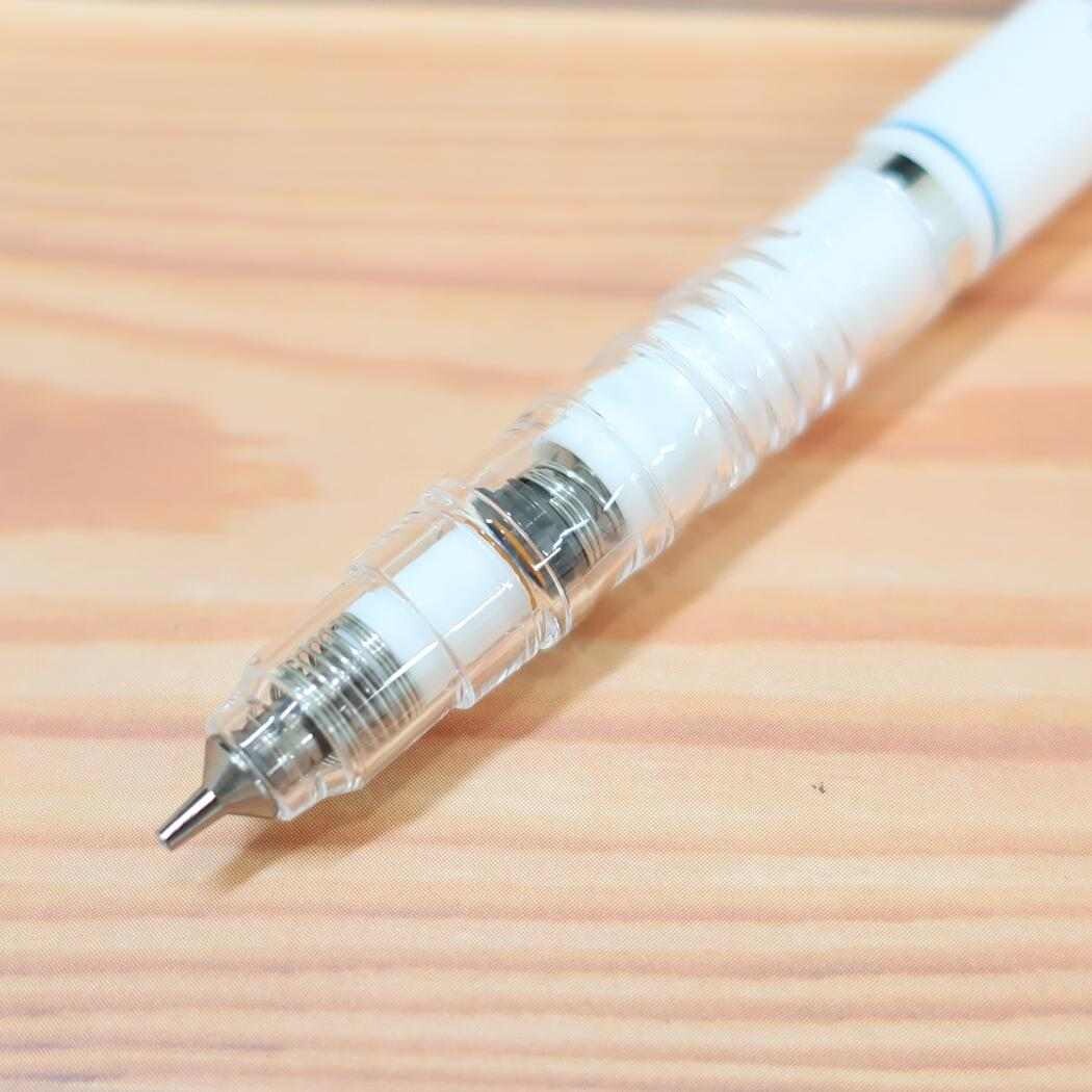 Mechanical pencil on a wooden surface