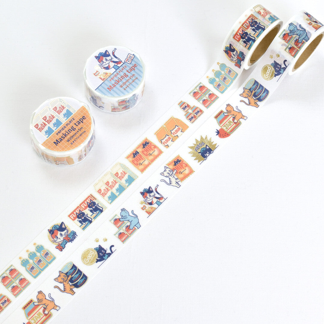 Decorative washi tape with cartoon cat designs on a white background