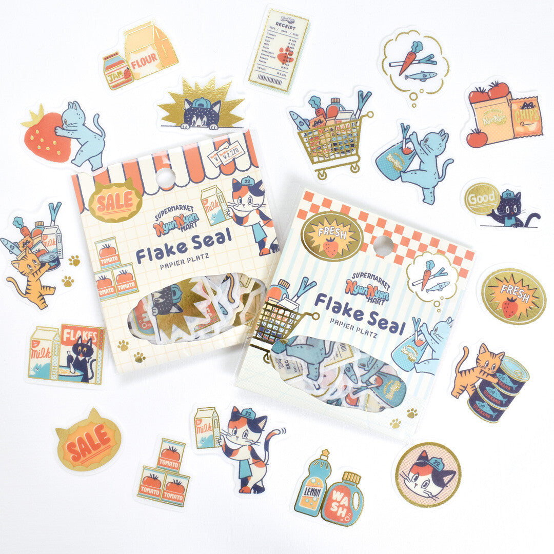 Set of Flake Seal packaging with cartoon cat illustrations on a white background