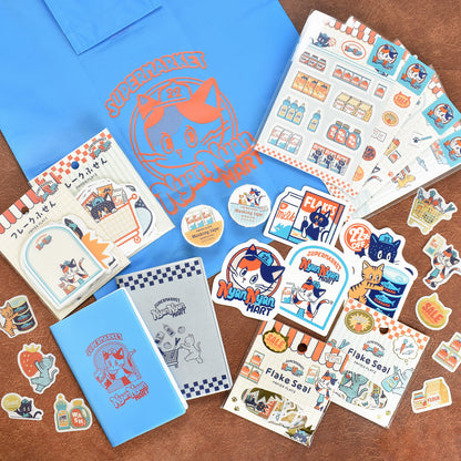 Collection of 'Nyan Nyan Mart' themed stationery items on a wooden surface