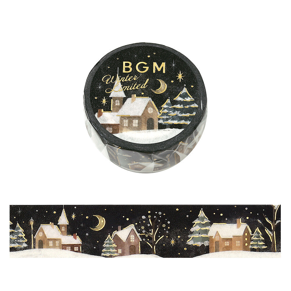 A roll of decorative washi tape with a winter village scene, shown both as a rolled product with the label 'BGM Winter limited' and as a flat strip displaying the printed pattern. The design features snow-covered houses, Christmas trees, stars, and a crescent moon on a dark background.