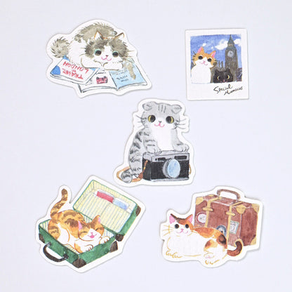 Set of cat-themed stickers on a light gray background