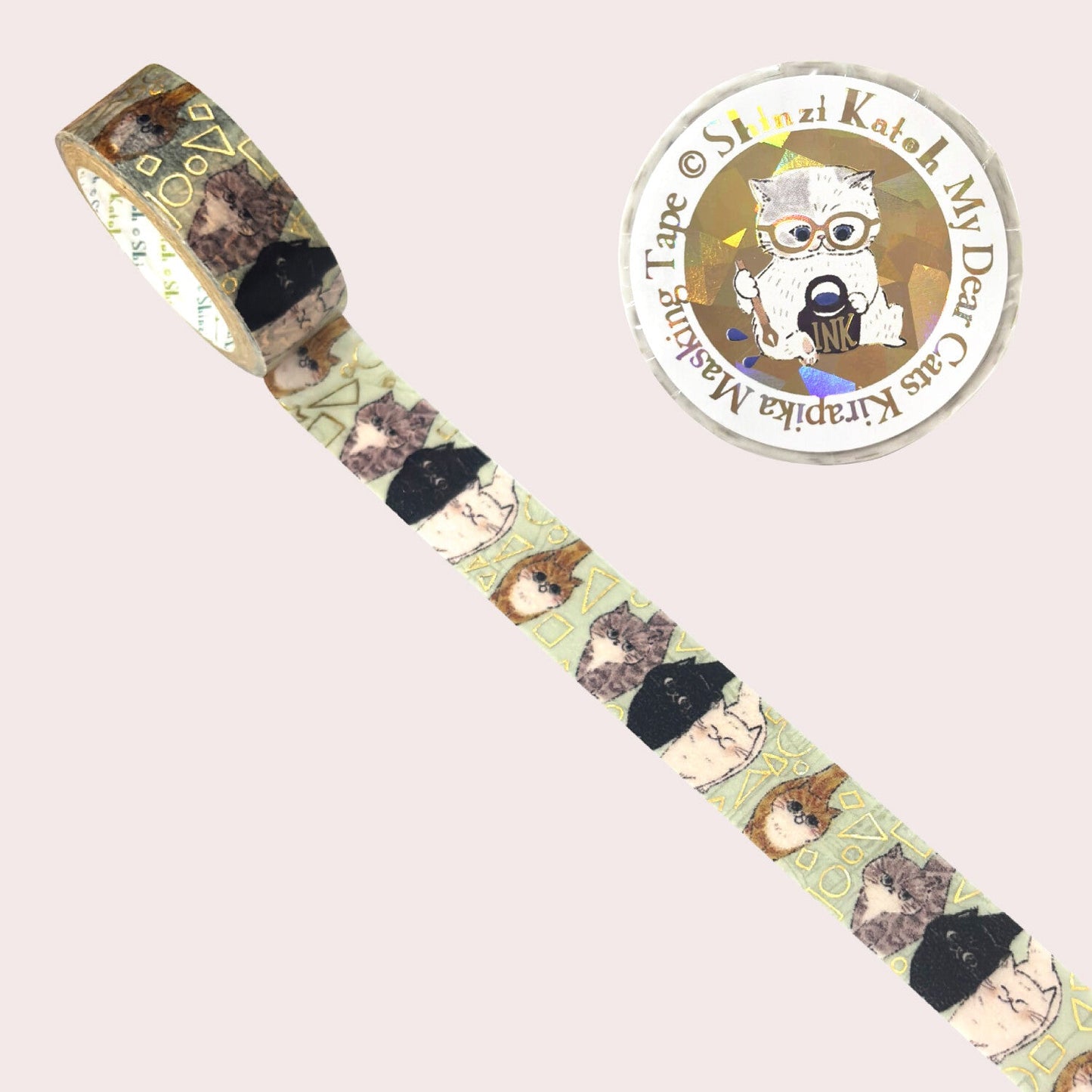 Curious cats themed washi tape shown unrolled diagonally, featuring illustrated cats in black, brown, and beige tones on a pale green background. 