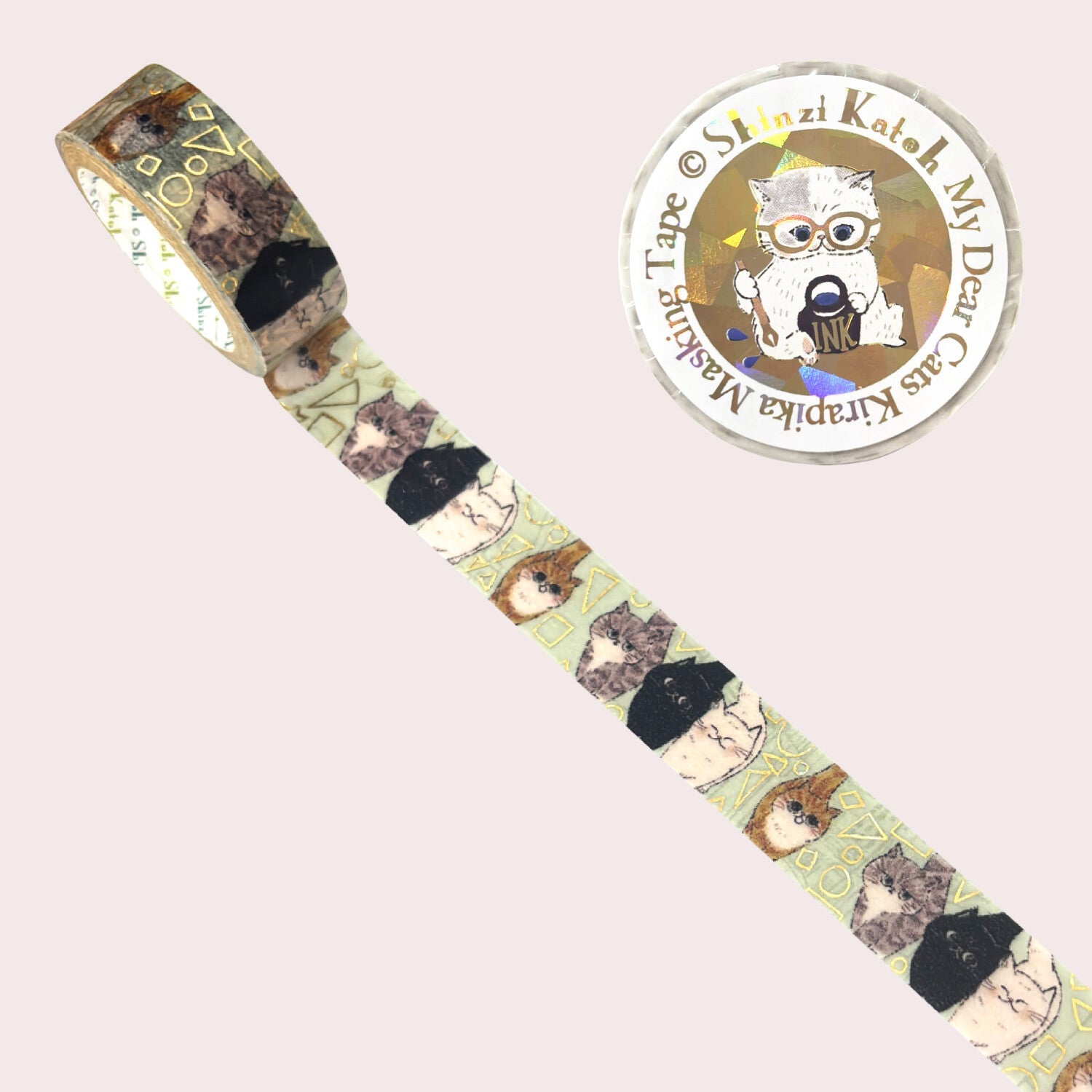 Curious cats themed washi tape shown unrolled diagonally, featuring illustrated cats in black, brown, and beige tones on a pale green background. 