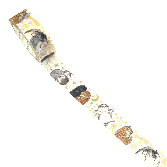 A roll of decorative washi tape featuring a whimsical pattern of sleeping cats, stars, and crescent moons on a cream background.