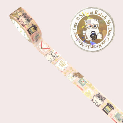 A roll of decorative washi tape with a vintage cat-themed postmark pattern, shown diagonally on a pale pink background.
