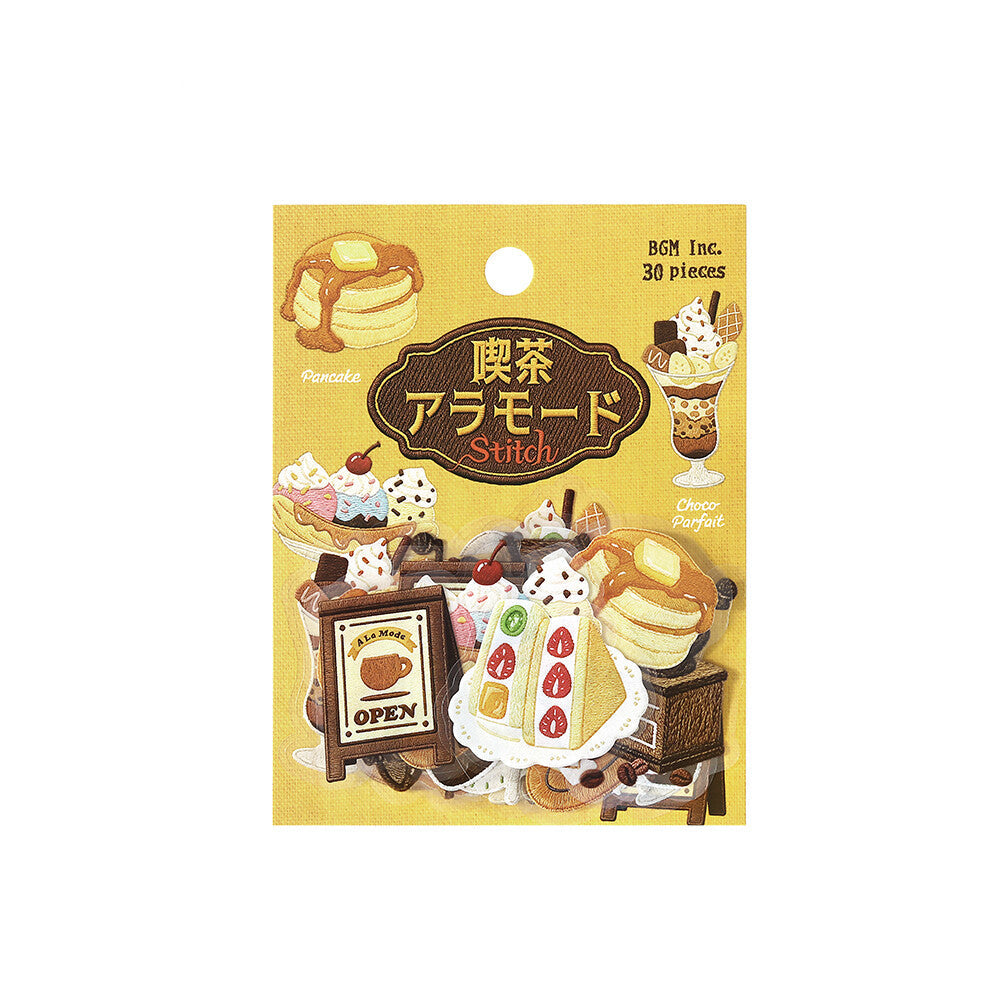 A package of stickers featuring a retro dessert theme, including pancakes, ice cream sundays, and milk tea. The packaging is yellow with detailed illustrations of the dessert-themed stickers.