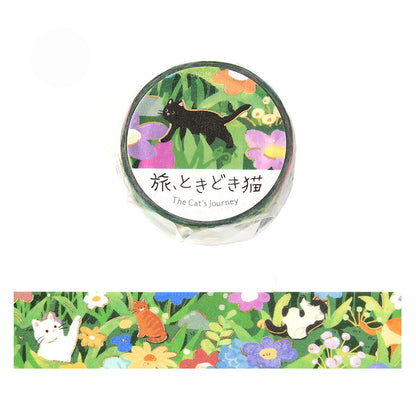 A roll of decorative washi tape labeled 'The Cat's Journey' with a black cat illustration on the label, shown above an unrolled section displaying a colorful floral and cat pattern. 