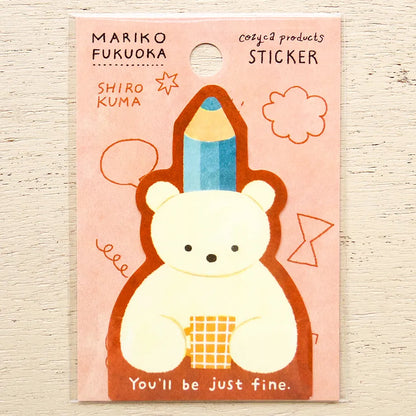 A packaged sticker featuring a cute bear-shaped character wearing a blue pencil as a hat, with the text 'MARIKO FUKUOKA' and 'SHIRO KUMA' on a pink backing card.