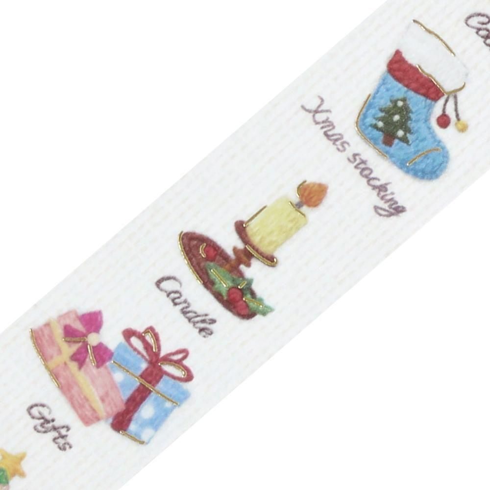 A close-up of a washi tape with Christmas-themed illustrations, including a blue Christmas stocking, a yellow candle, pink and blue gift boxes, and small script words such as 'Xmas stocking' and 'Gifts'.