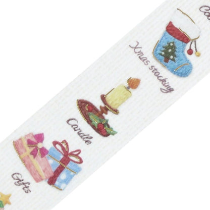 A close-up of a washi tape with Christmas-themed illustrations, including a blue Christmas stocking, a yellow candle, pink and blue gift boxes, and small script words such as 'Xmas stocking' and 'Gifts'.