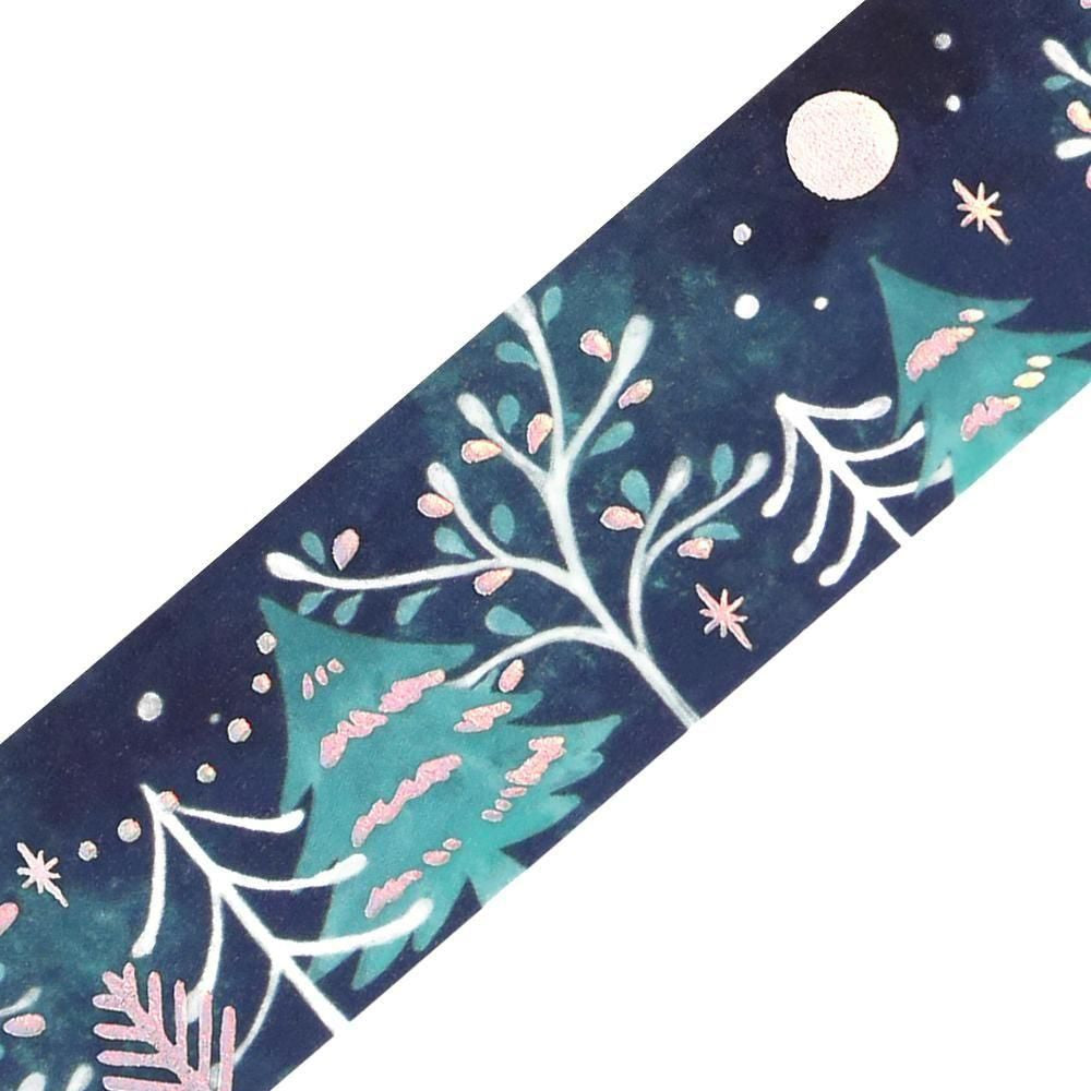 A navy decorative washi tape strip with a winter tree illustration