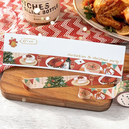 A festive Christmas-themed washi tape roll displayed on a wooden cutting board, with other rolls and a holiday table illustration shown in a styled flat-lay setting.