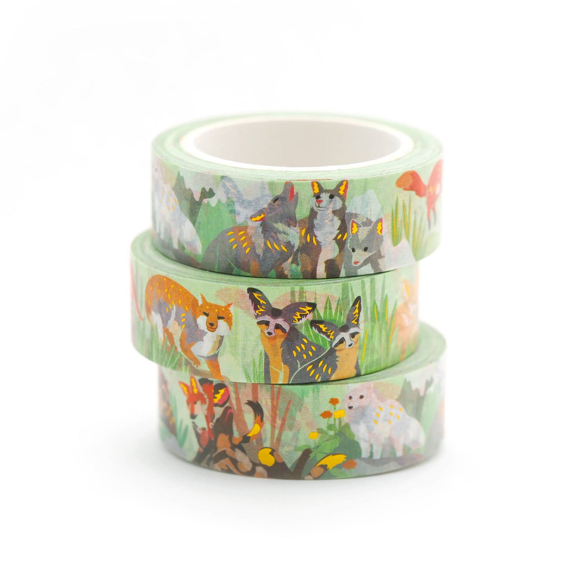 Three rolls of washi tape with animal designs on a white background
