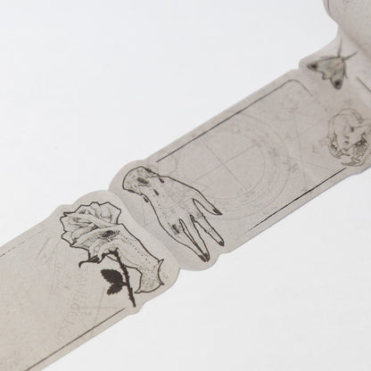 Decorative sticky notes with floral and hand designs on a white background