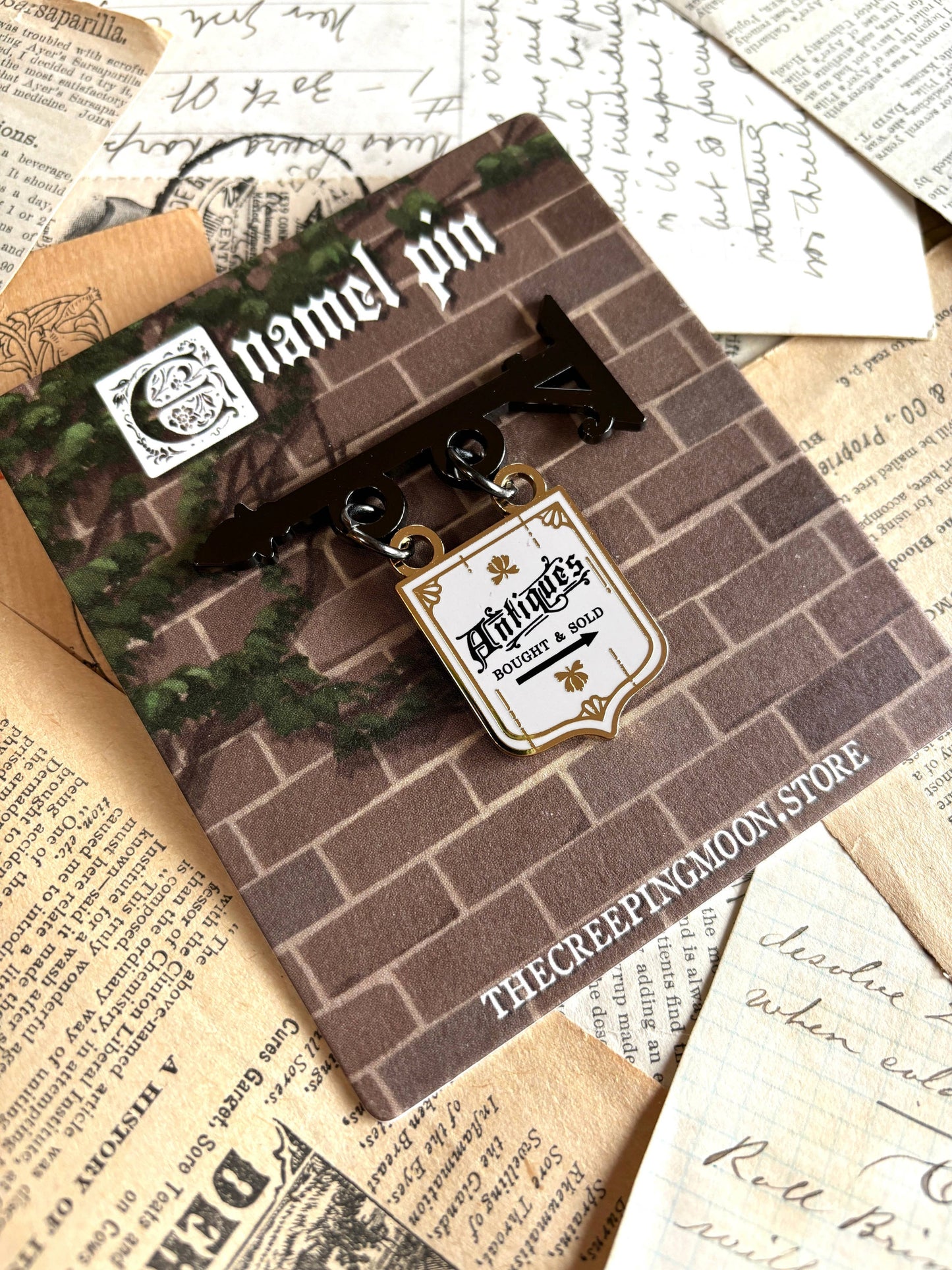 The Creeping Moon - Enamel Pin - Antique Shop Sign