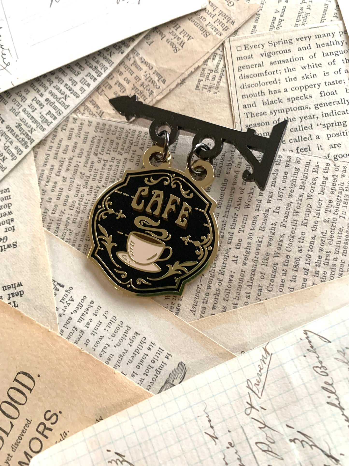 The Creeping Moon - Enamel Pin - Cafe Sign