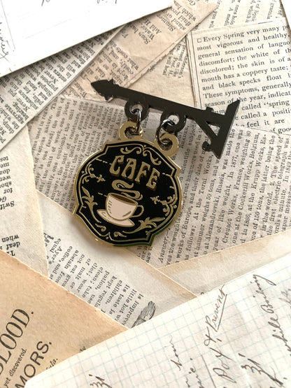 The Creeping Moon - Enamel Pin - Cafe Sign