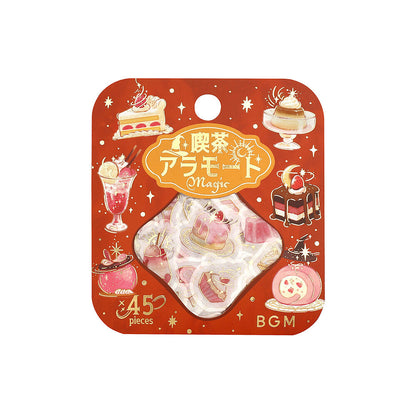Packaged stickers with illustrations of desserts and magical elements on a red background
