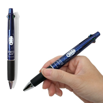 A blue and black Jetstream pen featuring the character No-Face from Spirited Away, shown both standing upright and held in a hand against a white background.