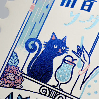 Illustration of a blue cat with a glass of soda on a decorative postcard with Japanese text.