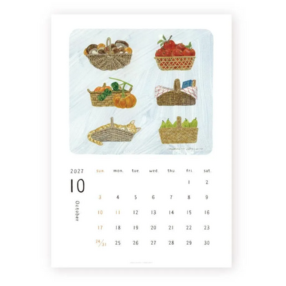 A single-page calendar print showing October 2027 with six illustrated autumn baskets and produce on a pale blue background, above a white calendar grid. The artwork is centered on a clean white background.