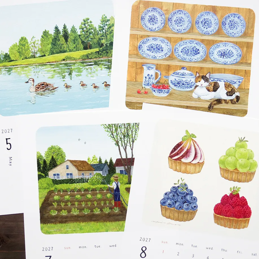 A collage of illustrated calendar pages showing watercolor-style scenes: ducks on a lake, blue-and-white ceramic dishes on shelves, a cat resting on a table, a vegetable garden with a person, and four fruit tart illustrations.