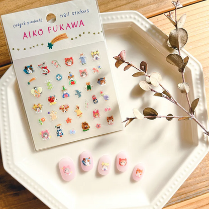 Nail stickers by Aiko Fukawa on a tray with decorative branch