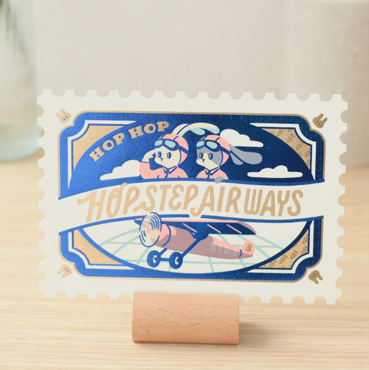 OB1TOY x ROKKAKU - Stamp-Shaped Foil-Embossed Postcard - Hop Step Airways